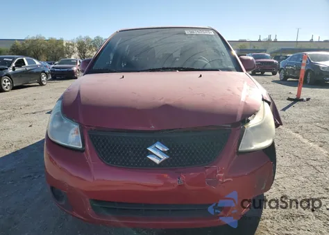 2012 Suzuki Sx4 Le z USA, uszkodzony, nr VIN JS2YC5A38C6302398